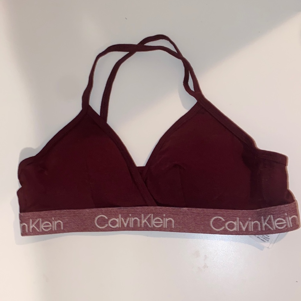 Calvin Klein Bra. Medium but fits smaller.